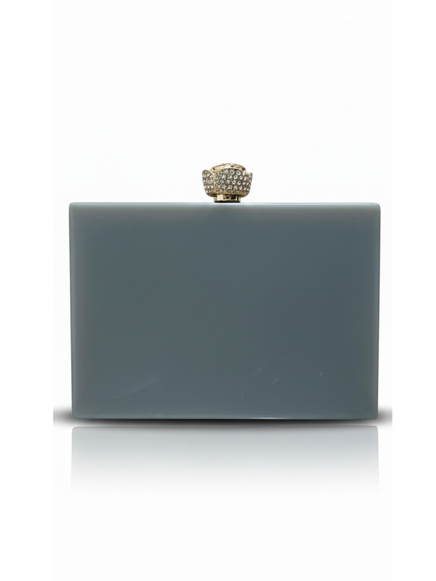 Grey Aura Resin Clutch with elegant grey base and Rhinestones work on the sides. Comes with a beautiful diamond studded Rose knob.
