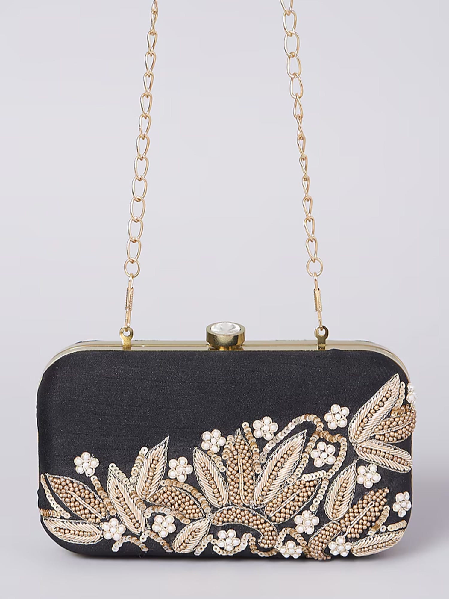 Black Dabka Leaf clutch bag with intricate embroidery, stylish accessory by aclutchstory for elegant occasions.