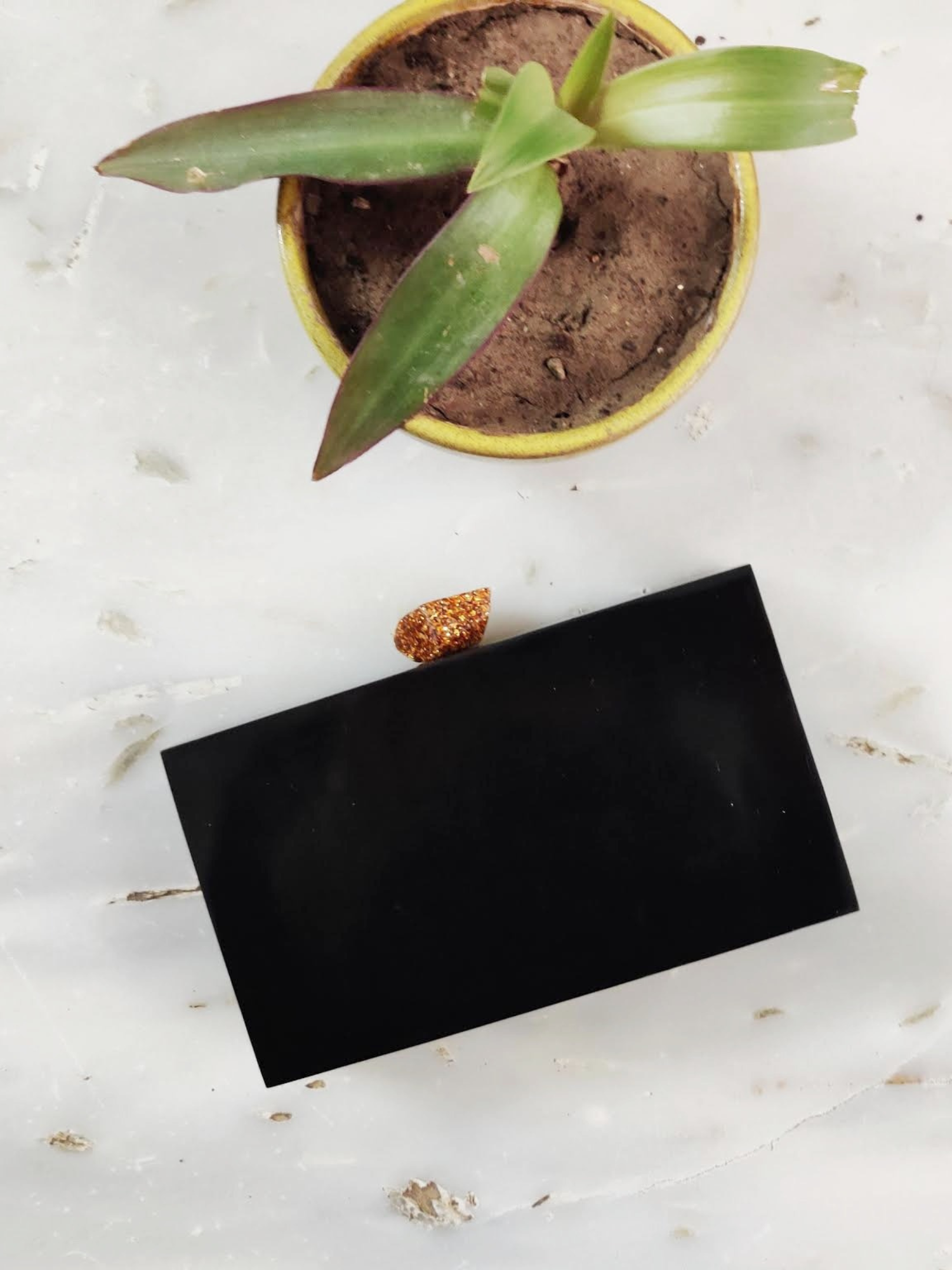 Black glitter engraved customized clutch bag with a sleek design, featuring personalized engraving for a stylish accessory.