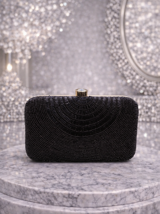 Black beaded Cleopatra clutch bag with intricate beadwork, stylish accessory perfect for evening and special occasions.