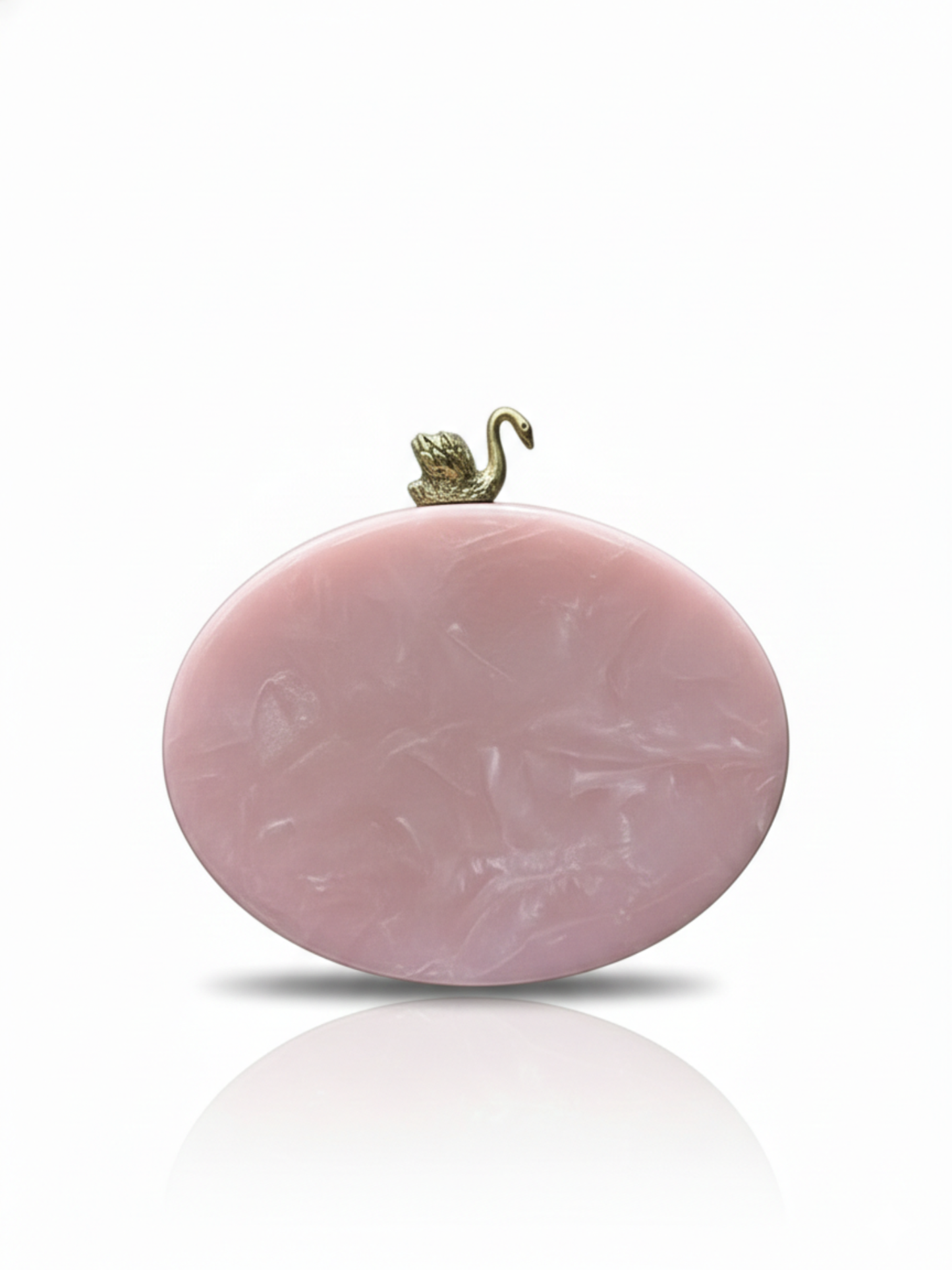 Resin oval clutch featuring stone work on a beautiful blush pink color. Comes with a beautiful Swan knob