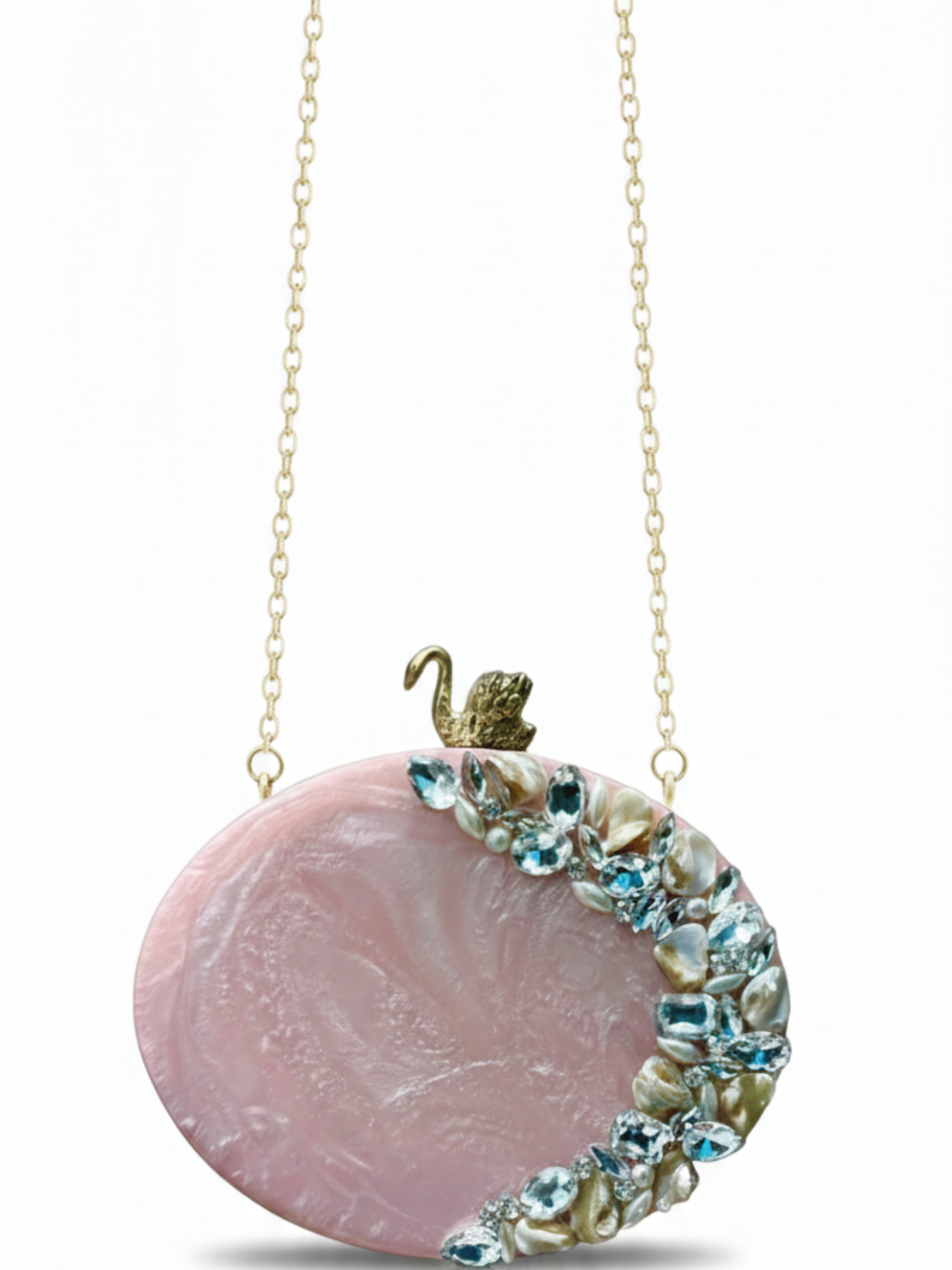 Resin oval clutch featuring stone work on a beautiful blush pink color. Comes with a long sling chain 