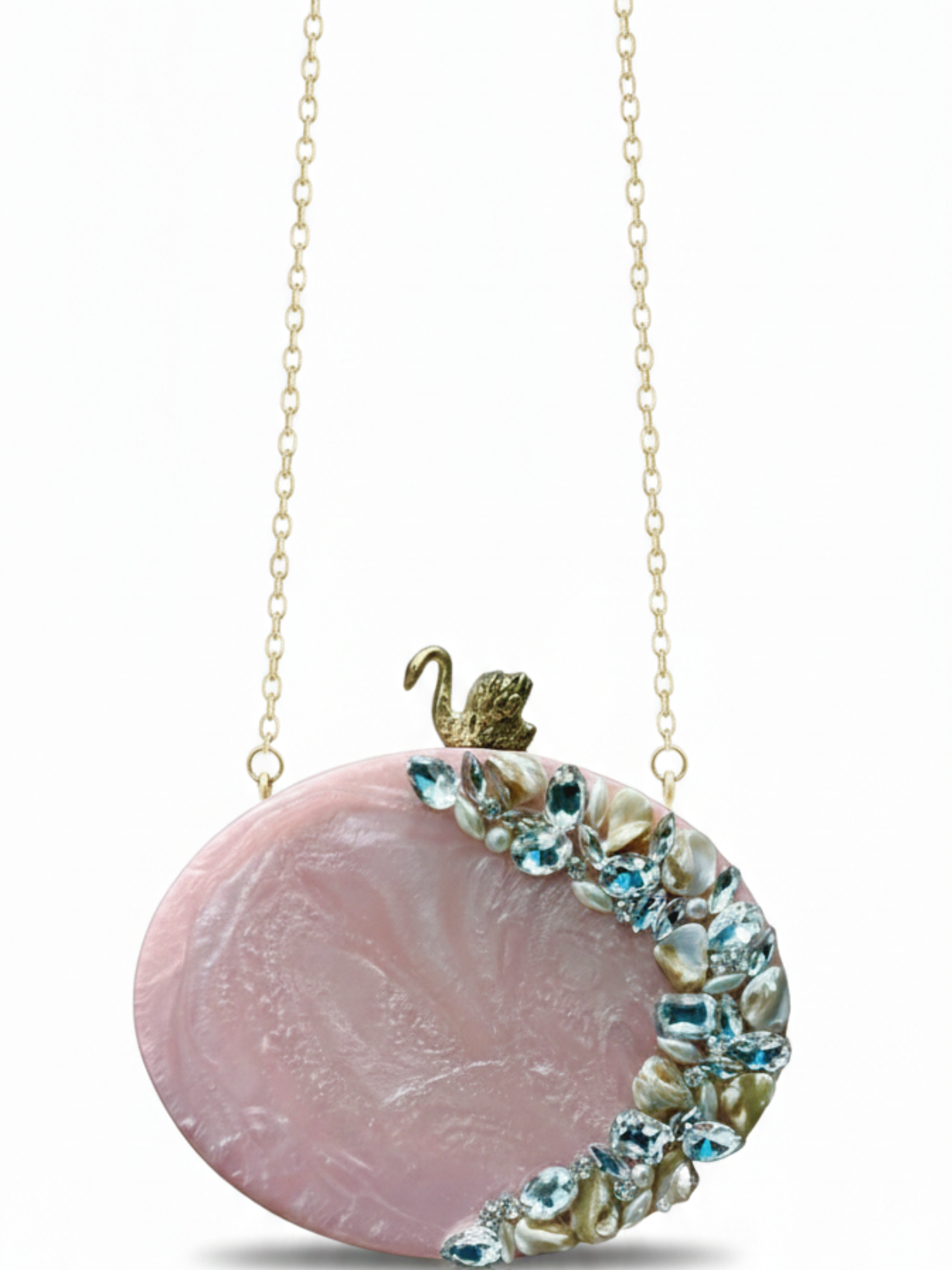 Resin oval clutch featuring stone work on a beautiful blush pink color. Comes with a long sling chain 