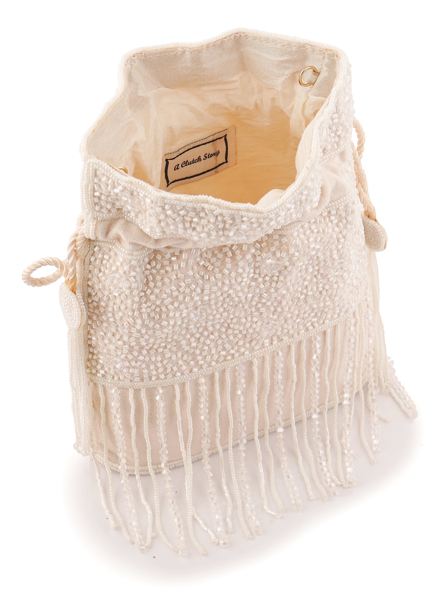 Handembroidered Chandrika Potli Bag by aclutchstory with intricate pearl embroidery and traditional design, ideal for festive occasions.