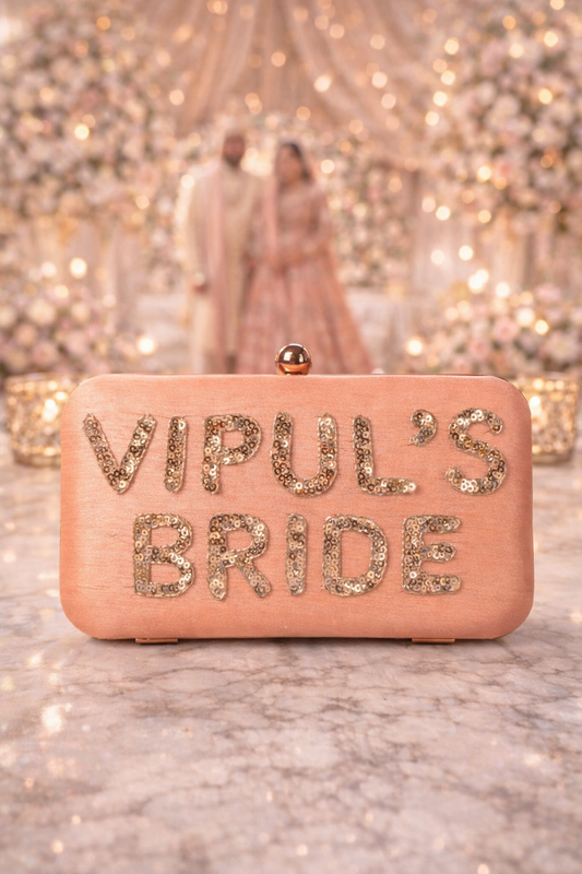 Customized bridal clutch by aclutchstory featuring elegant design and personalized details for brides' special day.