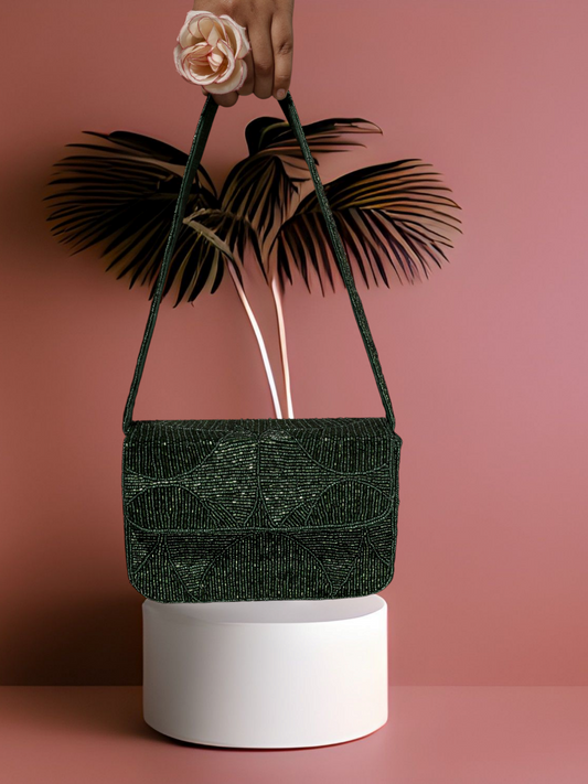 Beaded clutch purse from aclutchstory's Evergreen Luxe collection, featuring intricate beadwork and a sleek, elegant design.
