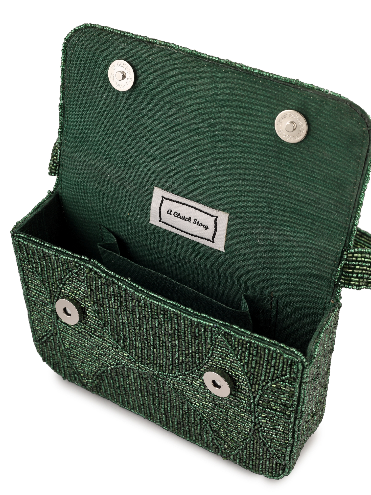 Beaded purse from aclutchstory's Evergreen Luxe collection, featuring intricate beadwork and a sleek, elegant design.