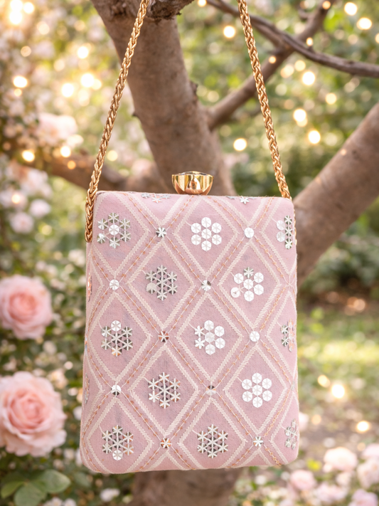 Dusty pink clutch bag by aclutchstory, featuring sleek design and compact style, perfect for evening or casual occasions.