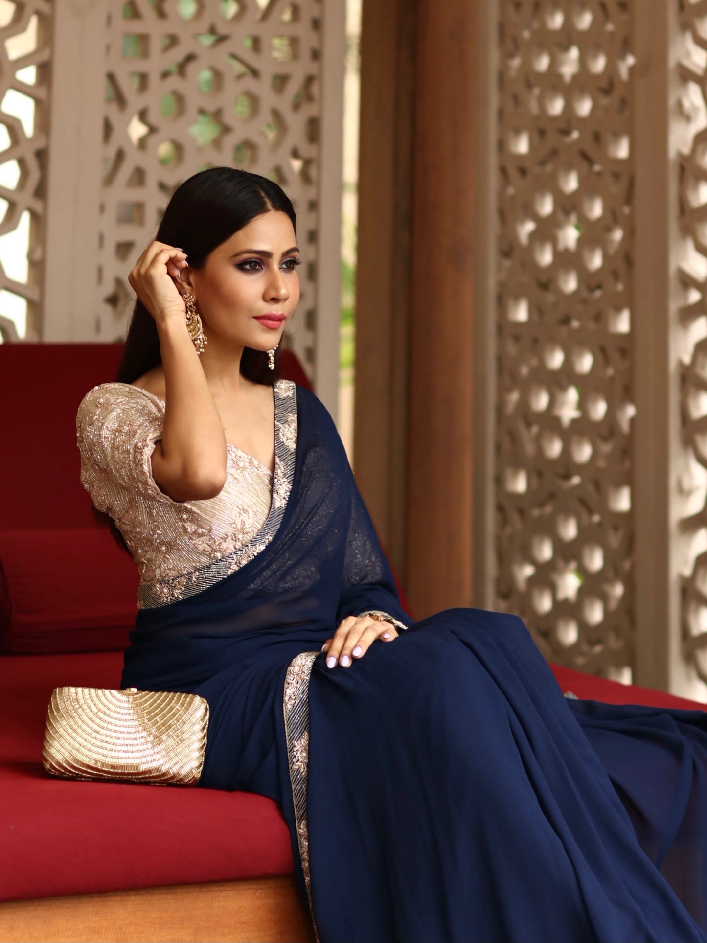 Gold Cleopatra clutch purse by Masoom Minawala from aclutchstory, featuring elegant design and intricate detailing.