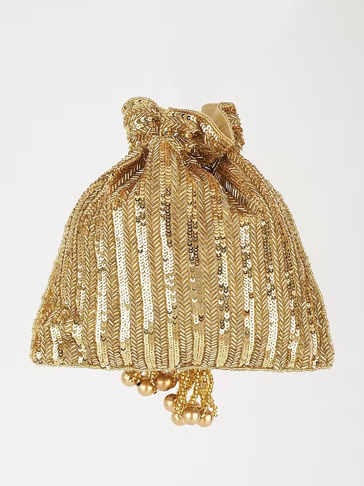 Gold sequins and hand-embroidery decorate a Rakul Preet potli bag with a traditional drawstring closure.