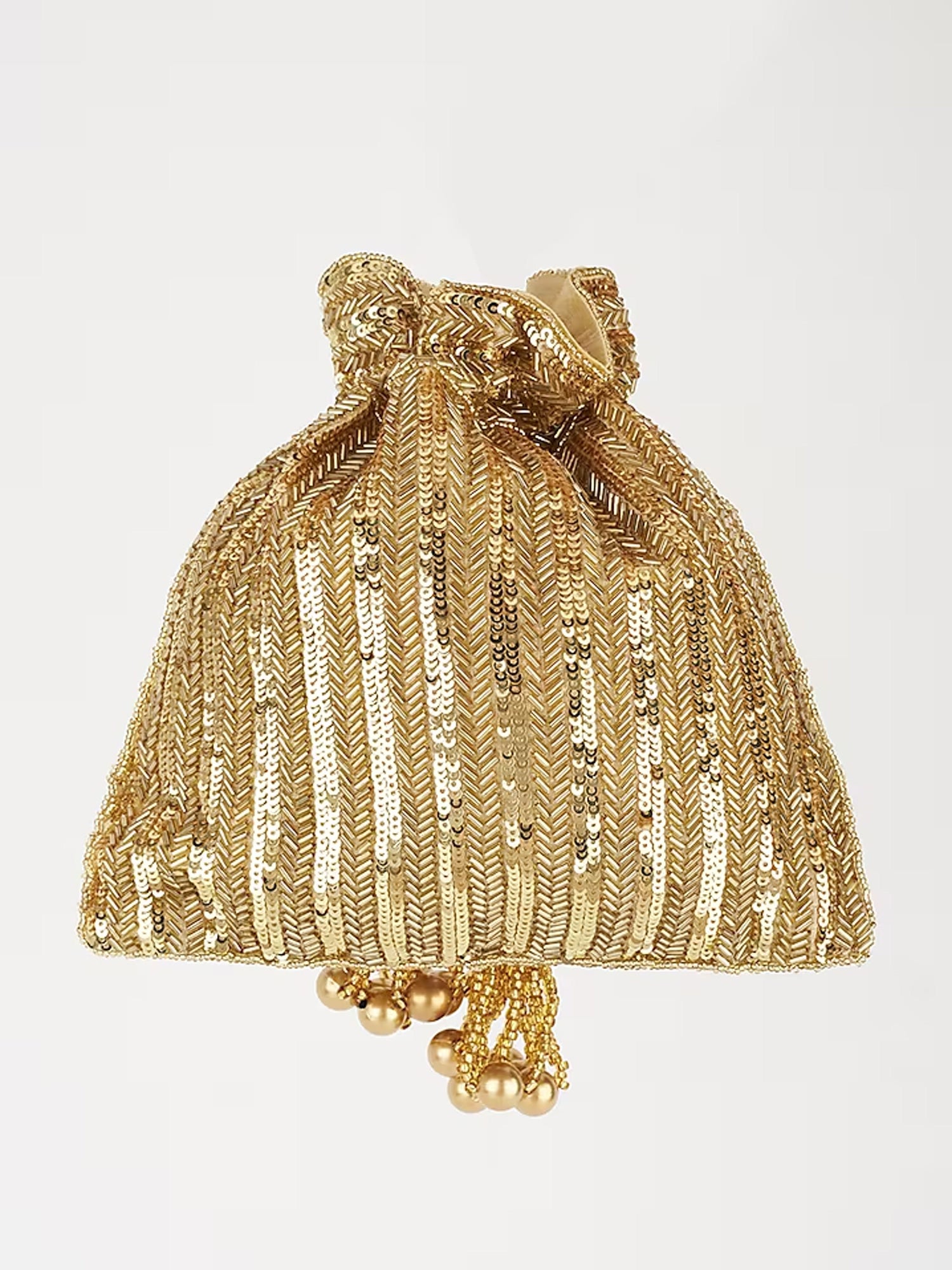 Gold sequins and hand-embroidery decorate a Rakul Preet potli bag with a traditional drawstring closure.