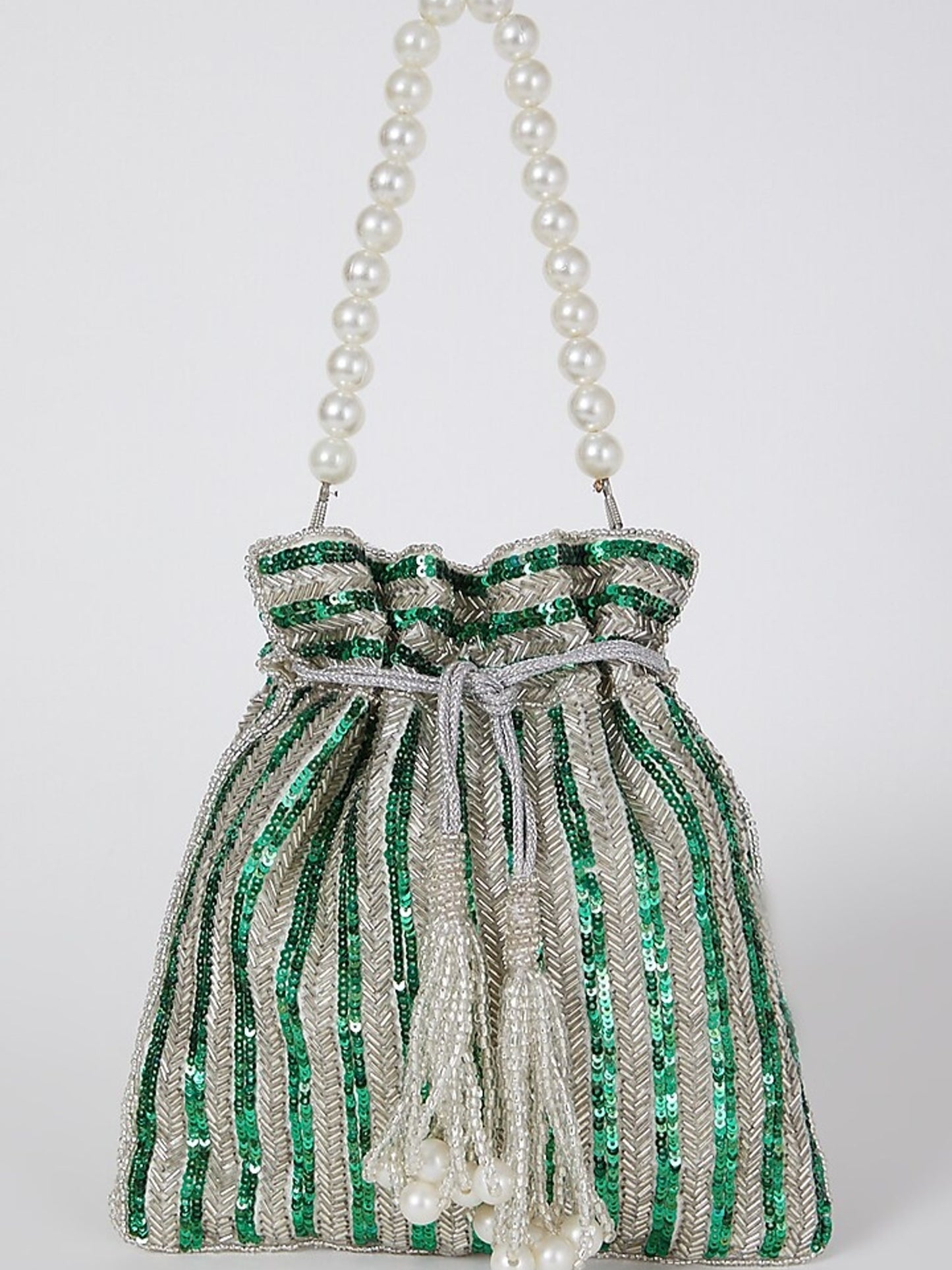 Green sequined hand-embroidered potli bag with intricate detailing, perfect for traditional occasions.