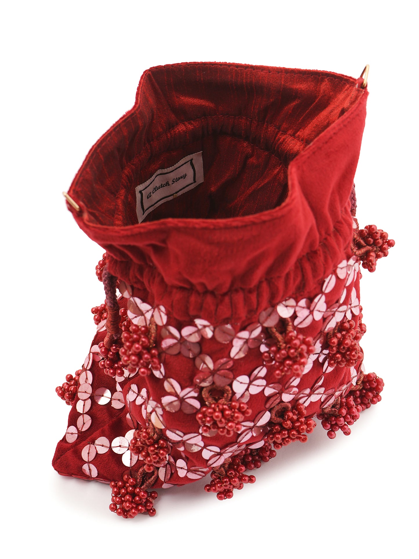 Handembroidered Gulab Potli Bag with intricate floral embroidery and traditional drawstring closure, made by aclutchstory.