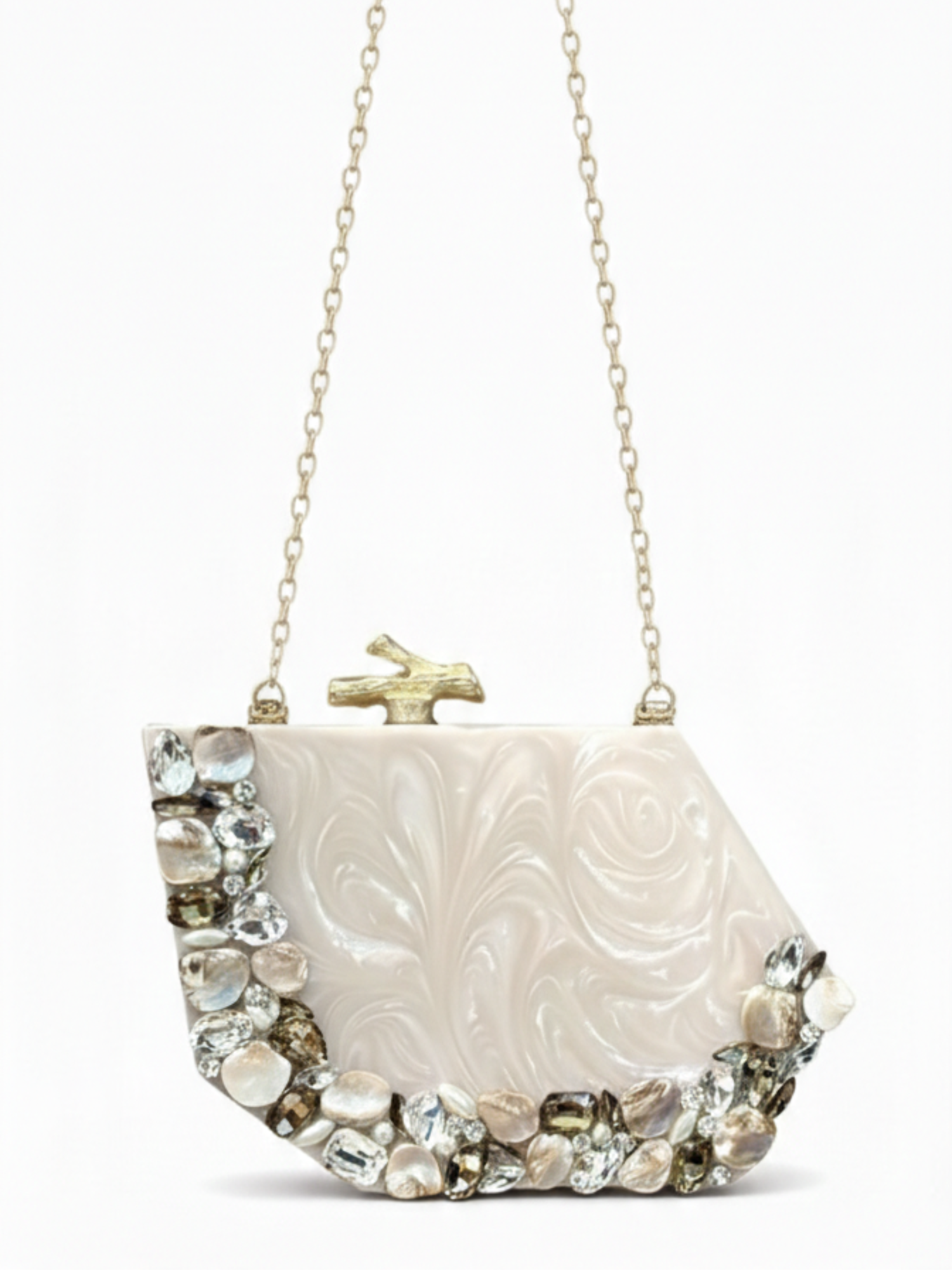 Ivory Resin Clutch with stone work on the sides. Comes with a long sling chain.