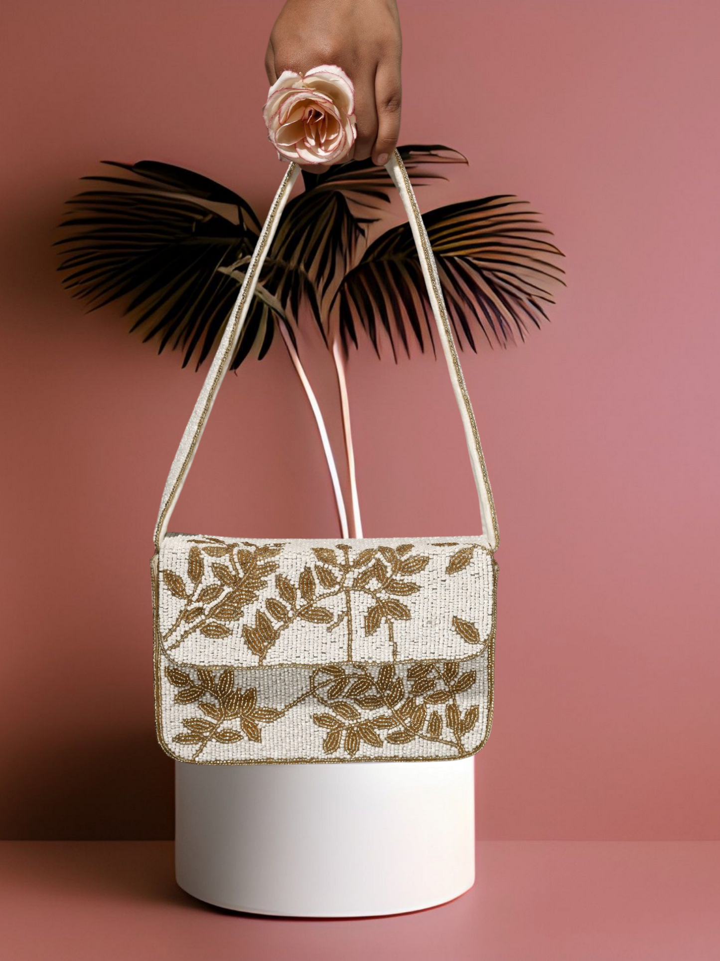 Ivory and gold gleam clutch purse with metallic finish and elegant design, perfect for evening events and special occasions.