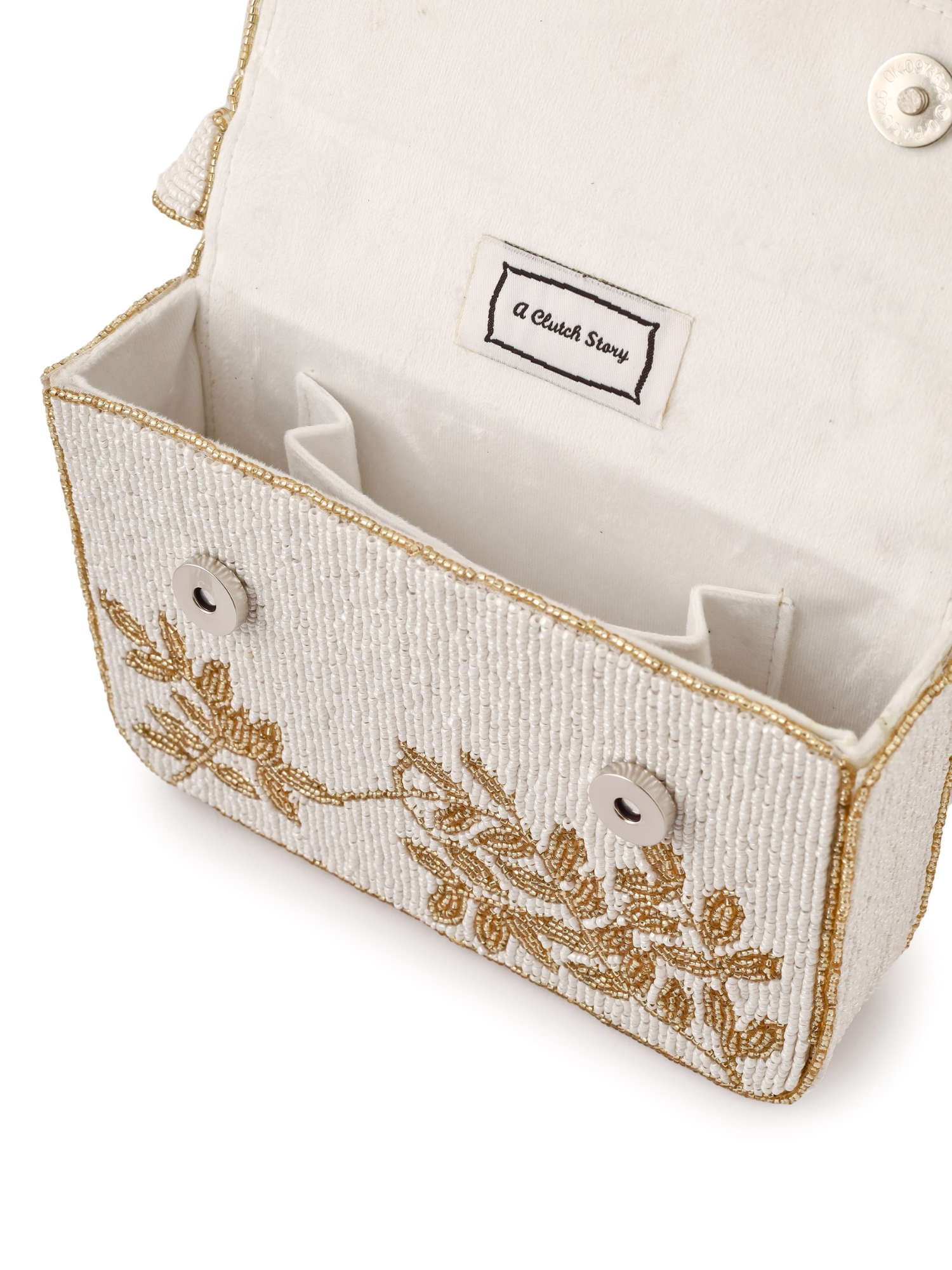 Ivory and gold Gleam purse by aclutchstory with elegant design and metallic accents, showcasing a stylish accessory for special occasions.
