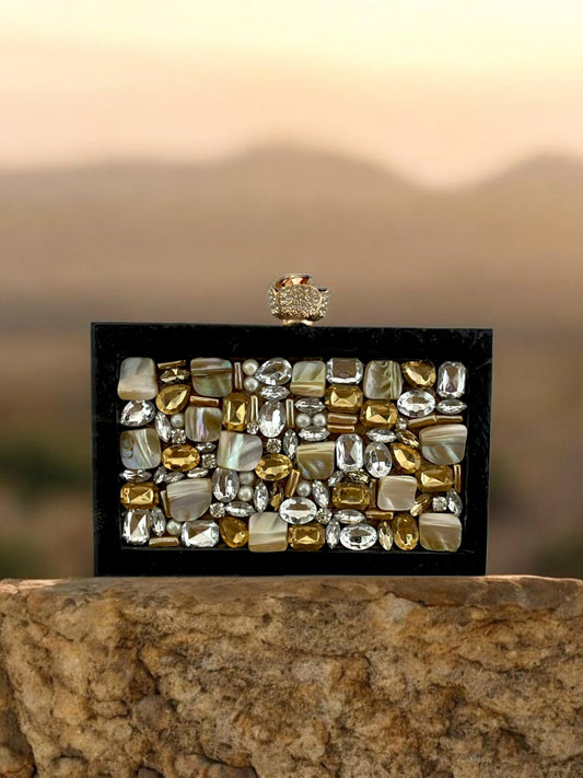 Midnight Aura clutch by aclutchstory featuring a sleek black design with elegant silver accents and minimalist style.