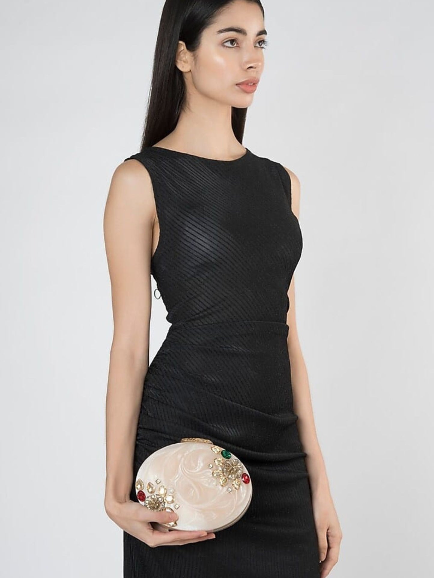 Oval agate resin clutch bag with a smooth, polished surface and elegant design from aclutchstory.