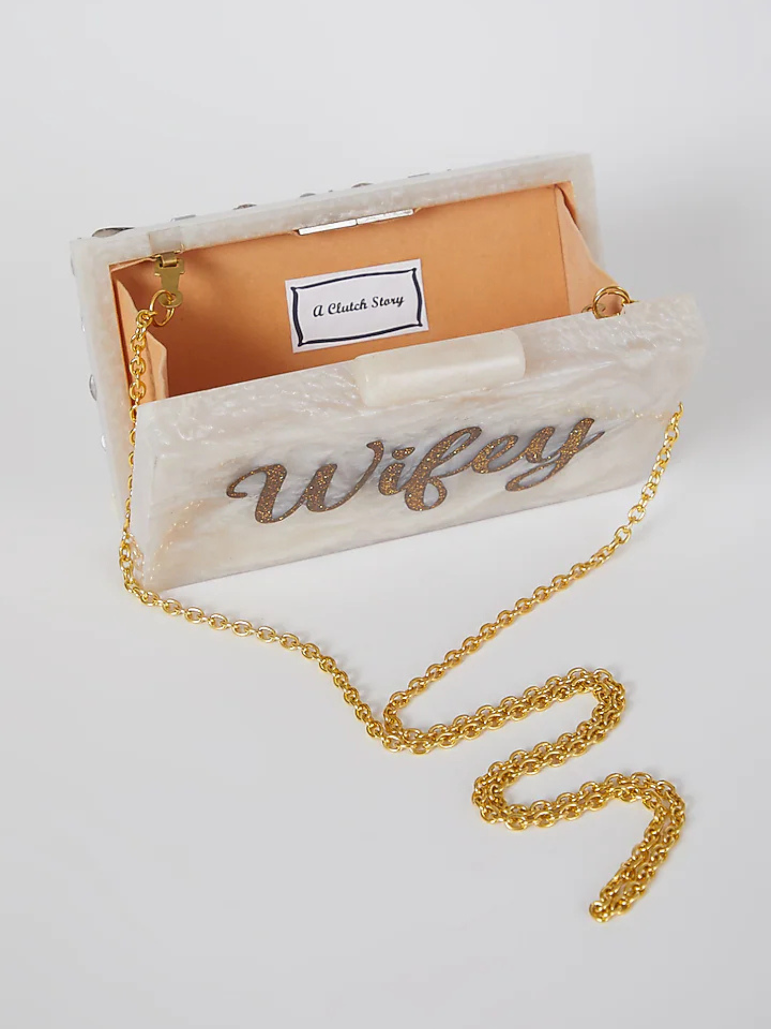 Wifey engraved two-way clutch bag by aclutchstory with sleek design and engraved text, perfect for stylish evenings or special occasions.