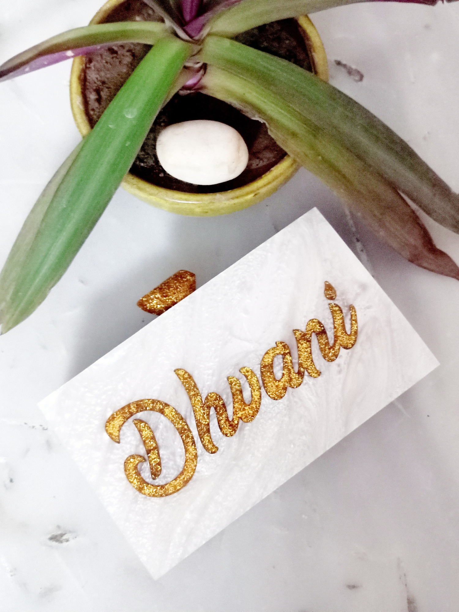 White glitter engraved customized clutch bag with a sleek design, perfect for evening events and personalized accessories.