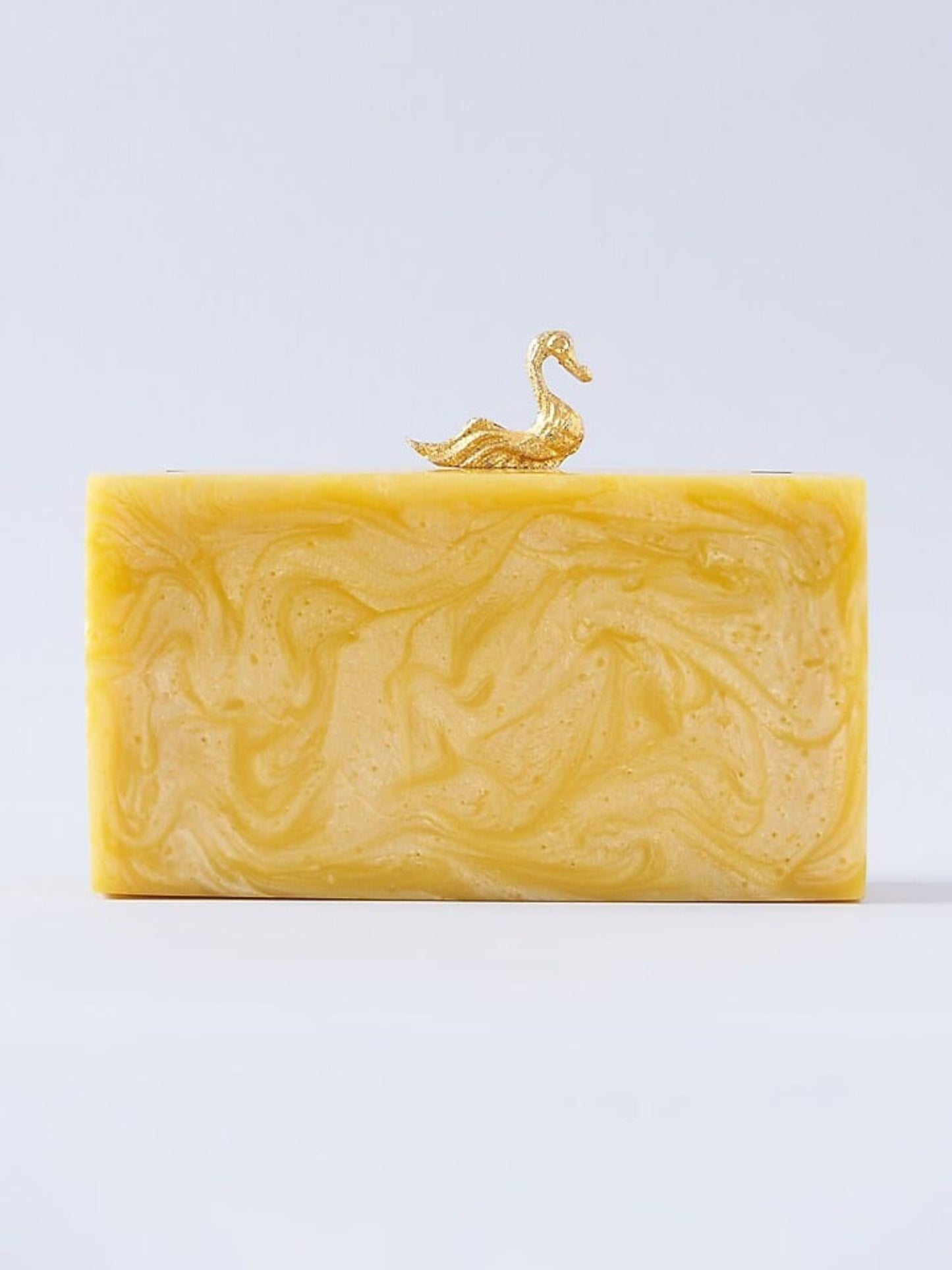 Swan-shaped resin clutch bag in white with gold accents, crafted by aclutchstory, showcasing a stylish evening accessory.