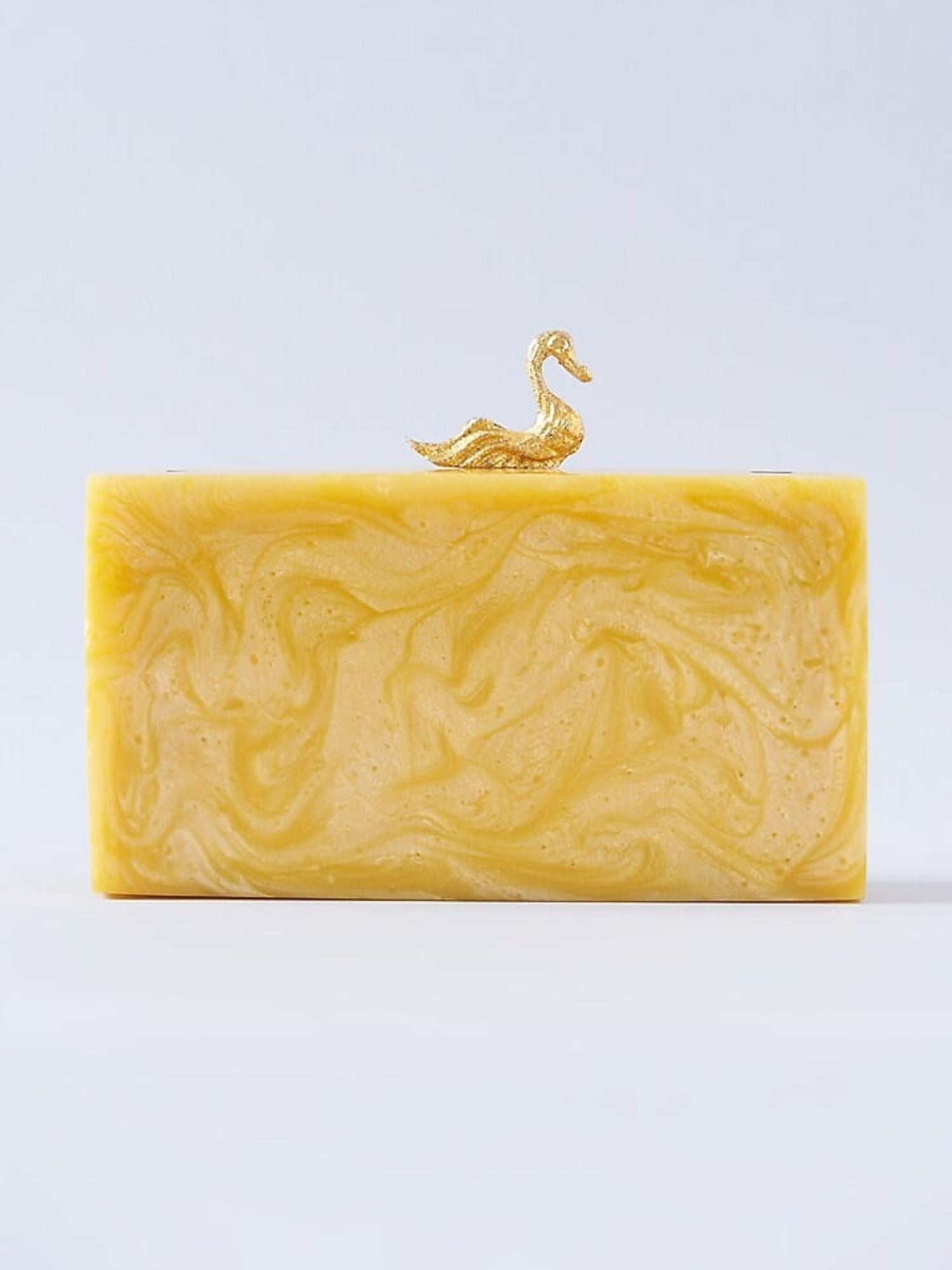 Swan-shaped resin clutch bag in white with gold accents, crafted by aclutchstory, showcasing a stylish evening accessory.