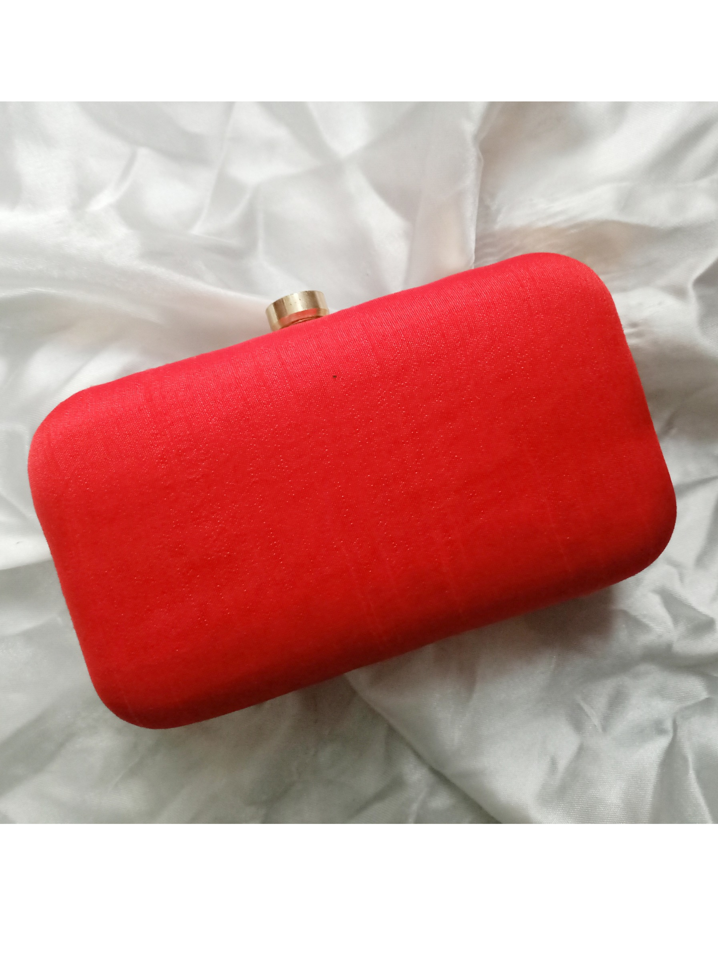 Customized red Dabka leaf clutch bag with intricate embroidery, stylish accessory for evening and special occasions.